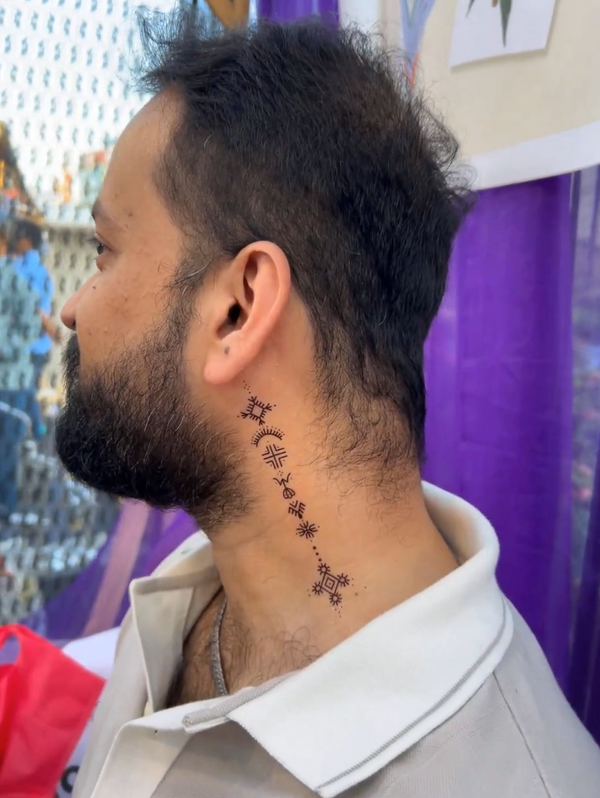Real customer wearing Runes of the Ancient Oracle